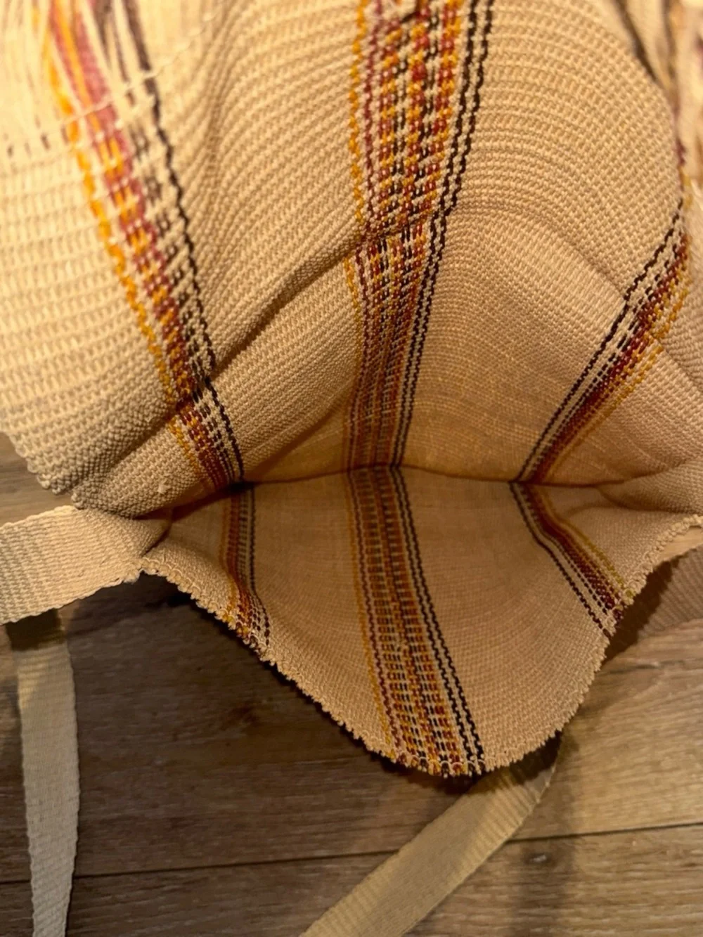 Handmade woven tote bag with vertical stripes in beige, brown, and orange